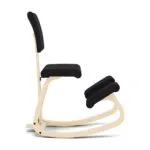 Varier Open-Box Variable Plus Kneeling Chair - Base: Black Lacquered Ash / Fabric: Revive Black, in an office setting