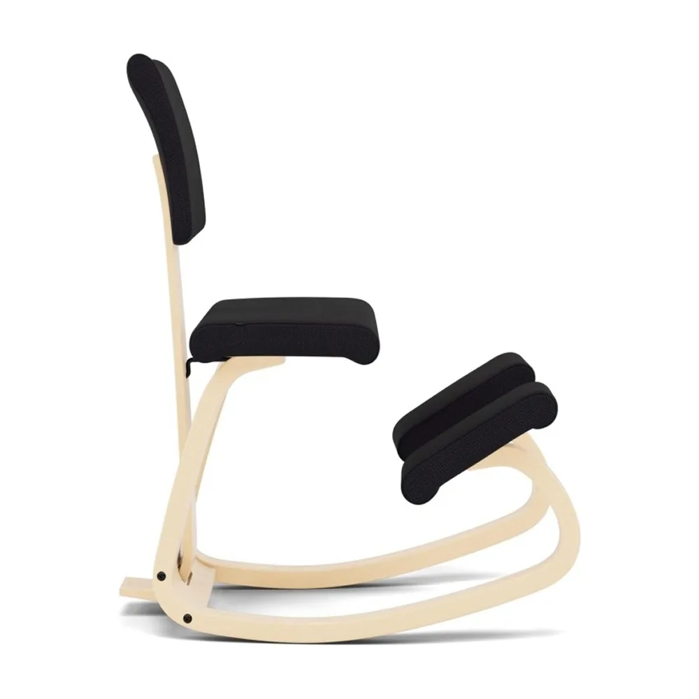 Varier Open-Box Variable Plus Kneeling Chair - Base: Black Lacquered Ash / Fabric: Revive Black, in an office setting